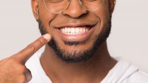 Man Showing His Dazzling Smile After Teeth Cleaning